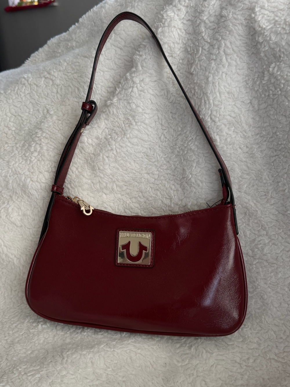 True Religion Deep Red Leather Shoulder Bag with Gold Logo